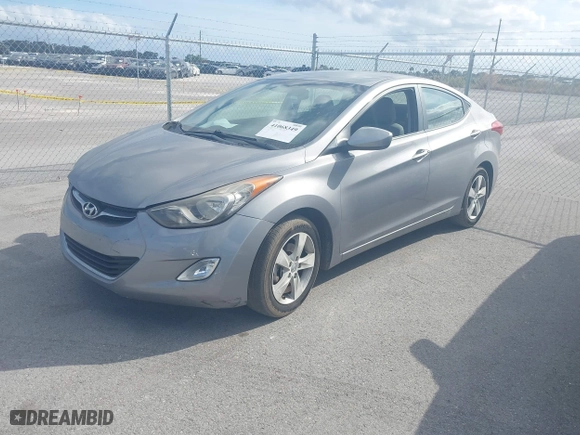 2013 Hyundai Elantra GLS PZEV with VIN KMHDH4AE9DU680860, listed as a IAAI auction lot 41068349 with 74,687 mi miles. Bid and sale history available at carsss.com. Image 2.