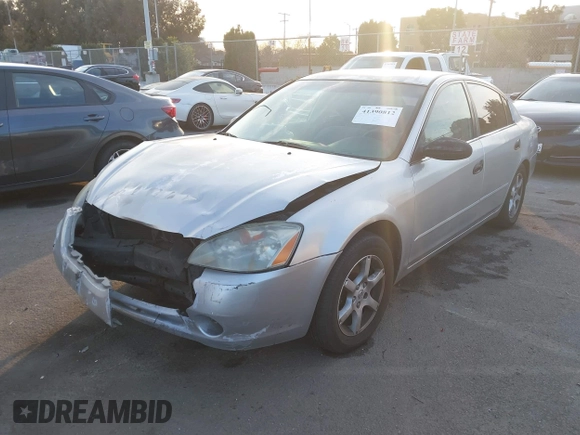 2002 Nissan Altima S with VIN 1N4AL11D72C174190, listed as a IAAI auction lot 41390812 with 171,646 mi miles. Bid and sale history available at carsss.com. Image 17.