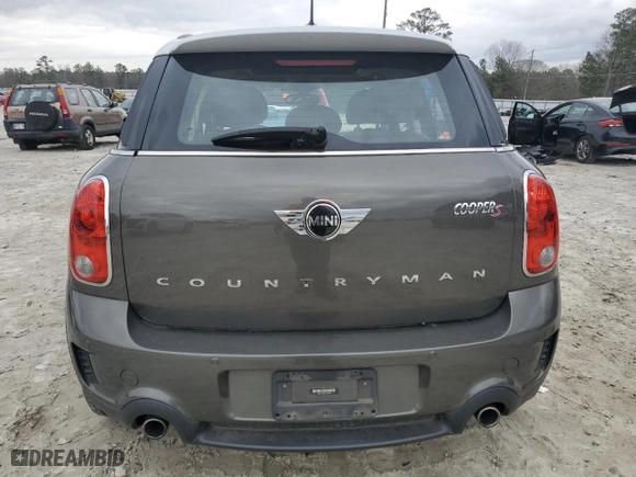 2014 MINI Cooper Countryman S with VIN WMWZC3C53EWT00673, listed as a Copart auction lot 44454065 with 76,561 mi miles and Salvage Title. Bid and sale history available at carsss.com. Image 6.