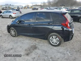 2017 Honda Fit LX with VIN 3HGGK5G52HM700121, listed as a Copart auction lot 87252954 with 113,561 mi miles and Salvage Title. Bid and sale history available at DreamBid. Image 2.