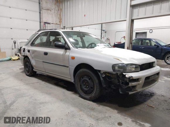 1999 Subaru Impreza L with VIN JF1GF4357XH811307, listed as a IAAI auction lot 41505426 with 195,693 mi miles and . Bid and sale history available at DreamBid. Image 1.