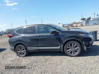 2021 Honda CR-V Touring with VIN 2HKRW2H96MH681908, listed as a IAAI auction lot 42082535 with 65,570 mi miles and . Bid and sale history available at DreamBid. Image 14.