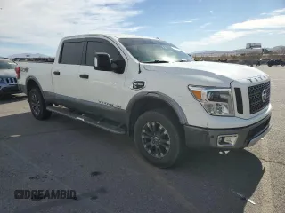 2018 Nissan Titan XD PRO-4X with VIN 1N6BA1F49JN548294, listed as a Copart auction lot 77817314 with 82,481 mi miles and Salvage Title. Bid and sale history available at carsss.com. Image 4.