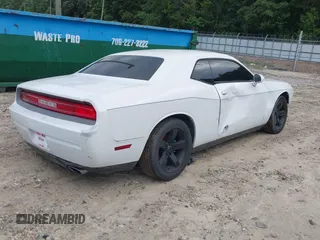 2013 Dodge Challenger SXT с VIN 2C3CDYAG0DH607372, выставлен на аукционе IAAI как лот 42819112 с пробегом 223 376 миль миль и . История ставок и продаж доступна на DreamBid. Изображение 4.