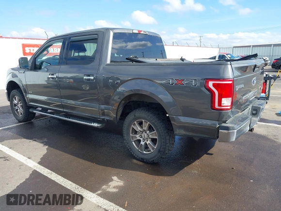 2015 Ford F-150 XLT with VIN 1FTEW1EG1FKE89277, listed as a IAAI auction lot 41752106 with 142,069 mi miles. Bid and sale history available at carsss.com. Image 3.
