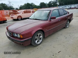 1995 BMW 5 Series 525i z VIN WBAHD6329SGK81651, wystawiony jako Copart lot #56547725 z przebiegiem 179 608 mil mil oraz Czysty tytuł • Clean title. Historia ofert i sprzedaży dostępna na DreamBid. Obrazek 1.