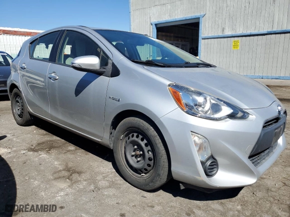 2015 Toyota Prius c One with VIN JTDKDTB30F1099699, listed as a Copart auction lot 49233655 with 106,041 mi miles and Salvage Title. Bid and sale history available at carsss.com. Image 4.