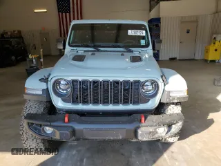 2024 Jeep Wrangler Rubicon X with VIN 1C4RJXFG5RW287542, listed as a Copart auction lot 72682924 with 5,792 mi miles and Salvage title. Bid and sale history available at DreamBid. Image 5.