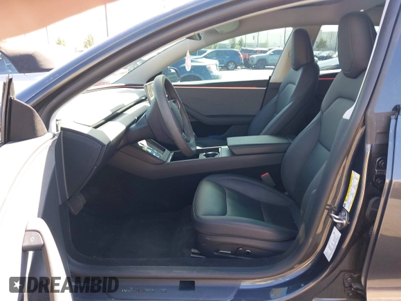 2024 Tesla Model 3 with VIN 5YJ3E1EA9RF849936, listed as a IAAI auction lot 41707656 with 18,749 mi miles and . Bid and sale history available at DreamBid. Image 5.