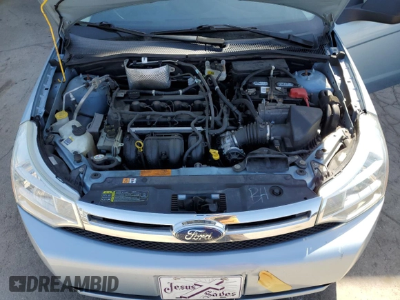 2009 Ford Focus SE z VIN 1FAHP35N69W183425, wystawiony jako Copart lot #54560985 z przebiegiem 159 305 mil mil oraz Szkoda całkowita • Salvage title. Historia ofert i sprzedaży dostępna na DreamBid. Obrazek 11.