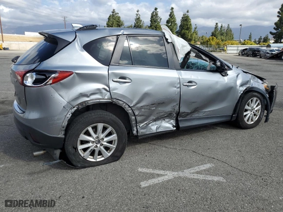 2014 Mazda CX-5 Touring with VIN JM3KE2CYXE0320996, listed as a Copart auction lot 51366485 with 102,472 mi miles and Salvage Title. Bid and sale history available at carsss.com. Image 3.