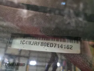 2014 Jeep Patriot Latitude z VIN 1C4NJRFB0ED714162, wystawiony jako Copart lot #55055685 z przebiegiem 122 698 mil mil oraz Szkoda całkowita • Salvage title. Historia ofert i sprzedaży dostępna na DreamBid. Obrazek 13.