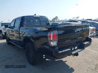 2022 Toyota Tacoma SR5 with VIN 3TMBZ5DN6NM034630, listed as a IAAI auction lot 42733932 with 43,309 mi miles and . Bid and sale history available at DreamBid. Image 3.