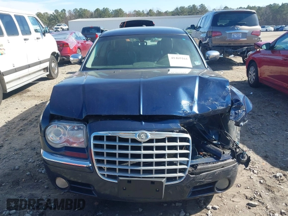 2005 Chrysler 300 with VIN 2C3JA63HX5H654114, listed as a IAAI auction lot 41469161 with 136,104 mi miles. Bid and sale history available at carsss.com. Image 13.