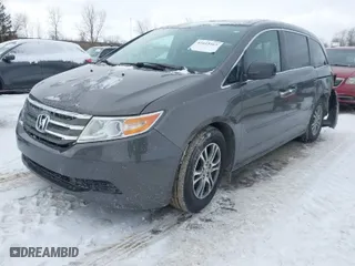 2013 Honda Odyssey EX-L with VIN 5FNRL5H65DB055040, listed as a IAAI auction lot 41615182 with 246,225 mi miles. Bid and sale history available at carsss.com. Image 2.