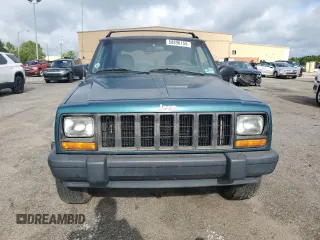 1998 Jeep Cherokee Sport with VIN 1J4FJ68S9WL249365, listed as a Copart auction lot 58896155 with 344,530 mi miles and Clean title. Bid and sale history available at DreamBid. Image 5.