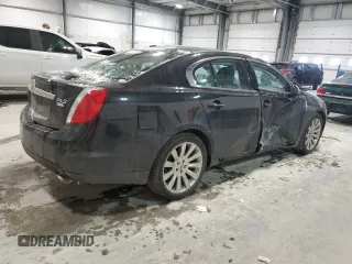 2012 Lincoln MKS z VIN 1LNHL9ER5CG806929, wystawiony jako Copart lot #85328514 z przebiegiem 155 015 mil mil oraz Szkoda całkowita • Salvage title. Historia ofert i sprzedaży dostępna na DreamBid. Obrazek 3.