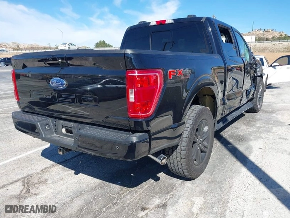 2021 Ford F-150 XL with VIN 1FTFW1E5XMFC81231, listed as a IAAI auction lot 41598484 with 29,840 mi miles. Bid and sale history available at carsss.com. Image 4.