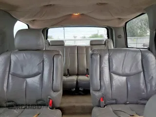 2004 Chevrolet Tahoe LT z VIN 1GNEC13Z84J171857, wystawiony jako Copart lot #57993315 z przebiegiem 239 893 mil mil oraz Szkoda całkowita • Salvage title. Historia ofert i sprzedaży dostępna na DreamBid. Obrazek 10.
