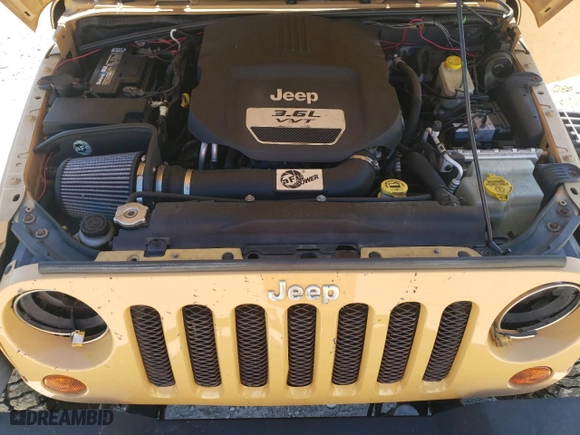 2013 Jeep Wrangler Unlimited Sport with VIN 1C4HJWDG7DL698573, listed as a Copart auction lot 49598425 with 103,029 mi miles and Salvage Title. Bid and sale history available at carsss.com. Image 13.
