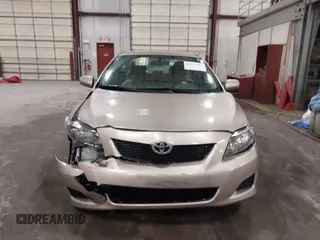 2009 Toyota Corolla with VIN 1NXBU40E19Z014460, listed as a IAAI auction lot 41973023 with 74,927 mi miles. Bid and sale history available at carsss.com. Image 12.