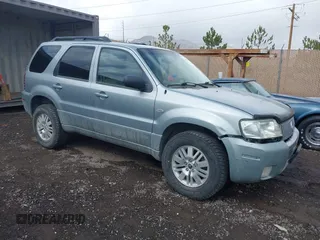 2005 Mercury Mariner Luxury z VIN 4M2CU57145DJ22822, wystawiony jako IAAI lot #41932692 z przebiegiem 167 263 mil mil oraz . Historia ofert i sprzedaży dostępna na DreamBid. Obrazek 1.