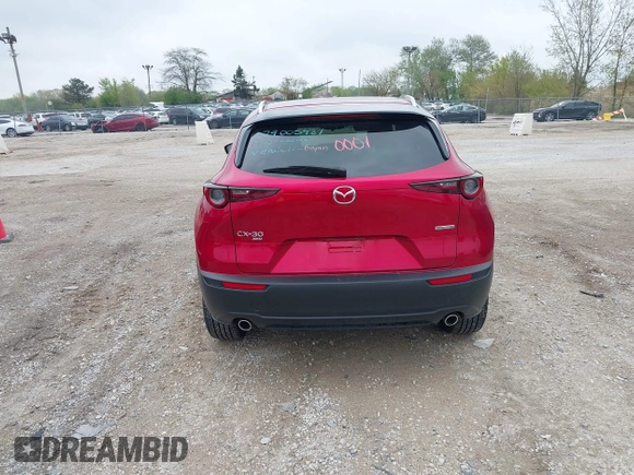 2023 Mazda CX-30 S Premium with VIN 3MVDMBDM3PM511402, listed as a IAAI auction lot 42180001 with 6,189 mi miles and . Bid and sale history available at DreamBid. Image 17.