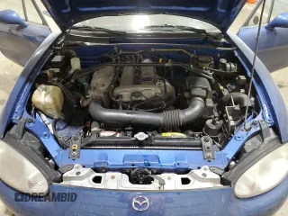 1999 Mazda MX-5 Miata with VIN JM1NB3532X0136645, listed as a Copart auction lot 59480265 with 160,936 mi miles and Clean title. Bid and sale history available at DreamBid. Image 11.