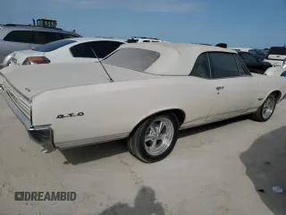 1966 Pontiac GTO z VIN 242676P246352, wystawiony jako Copart lot #75298684 z przebiegiem 79 942 mil mil oraz Szkoda całkowita • Salvage title. Historia ofert i sprzedaży dostępna na DreamBid. Obrazek 3.