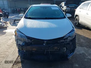 2019 Toyota Corolla L z VIN 5YFBURHE9KP889651, wystawiony jako IAAI lot #41651217 z przebiegiem 95 598 mil mil oraz . Historia ofert i sprzedaży dostępna na DreamBid. Obrazek 13.