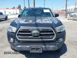 2018 Toyota Tacoma SR5 with VIN 3TMAZ5CN1JM061127, listed as a IAAI auction lot 42012247 with 119,381 mi miles and . Bid and sale history available at DreamBid. Image 12.