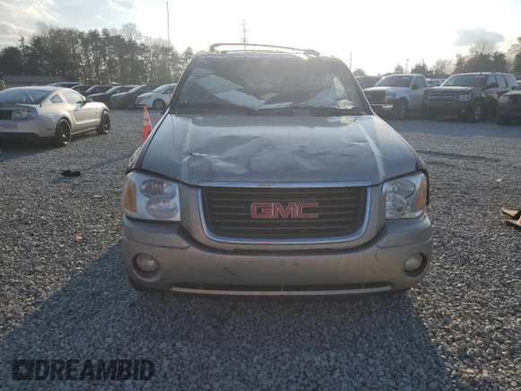 2003 GMC Envoy SLE with VIN 1GKDS13S732156385, listed as a Copart auction lot 79925184 with 233,958 mi miles and Salvage Title. Bid and sale history available at carsss.com. Image 5.