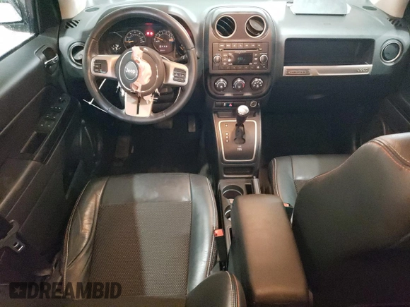 2017 Jeep Compass Sport with VIN 1C4NJCBB1HD141280, listed as a Copart auction lot 58989715 with 61,744 mi miles and Salvage title. Bid and sale history available at DreamBid. Image 8.