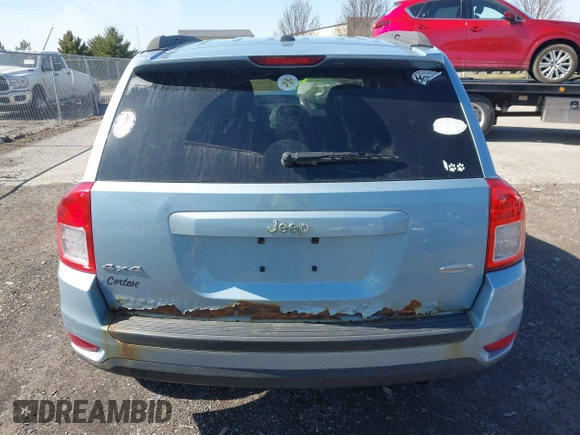 2013 Jeep Compass Latitude with VIN 1C4NJDEB2DD263920, listed as a IAAI auction lot 41832542 with 128,018 mi miles. Bid and sale history available at carsss.com. Image 16.