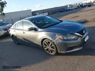 2018 Nissan Altima 2.5 SV with VIN 1N4AL3AP0JC136126, listed as a IAAI auction lot 41431759 with 170,825 mi miles. Bid and sale history available at carsss.com. Image 13.