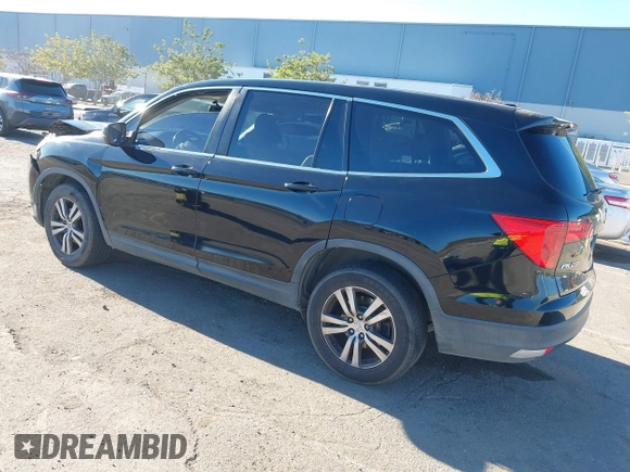 2018 Honda Pilot EX-L with VIN 5FNYF5H58JB013113, listed as a IAAI auction lot 41313206 with 125,825 mi miles. Bid and sale history available at carsss.com. Image 3.