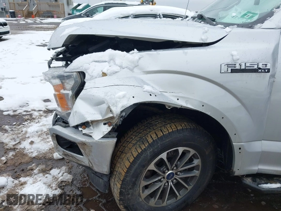 2018 Ford F-150 XL with VIN 1FTFW1E54JKC59793, listed as a IAAI auction lot 41558134 with 217,831 mi miles. Bid and sale history available at carsss.com. Image 17.
