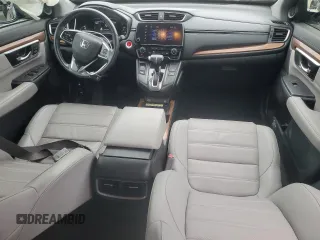2021 Honda CR-V Touring with VIN 2HKRW1H96MH420465, listed as a Copart auction lot 86885384 with 61,699 mi miles and Salvage Title. Bid and sale history available at carsss.com. Image 8.