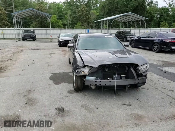 2014 Dodge Charger SXT z VIN 2C3CDXHGXEH261414, wystawiony jako Copart lot #55871705 z przebiegiem 221 000 mil mil oraz Szkoda całkowita • Salvage title. Historia ofert i sprzedaży dostępna na DreamBid. Obrazek 14.