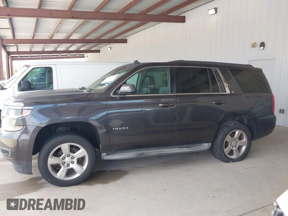 2015 Chevrolet Tahoe LT with VIN 1GNSCBKC5FR105437, listed as a IAAI auction lot 42052084 with 348,093 mi miles and . Bid and sale history available at DreamBid. Image 14.