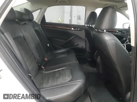 2013 Volkswagen Passat SEL Premium z VIN 1VWCP7A30DC100014, wystawiony jako Copart lot #55271515 z przebiegiem 139 484 mil mil oraz Szkoda całkowita • Salvage title. Historia ofert i sprzedaży dostępna na DreamBid. Obrazek 10.