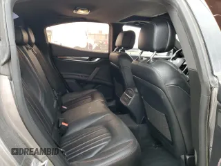 2016 Maserati Ghibli S Q4 z VIN ZAM57RTA6G1172334, wystawiony jako Copart lot #56601575 z przebiegiem 109 524 mil mil oraz Szkody całkowita. Historia ofert i sprzedaży dostępna na DreamBid. Obrazek 10.
