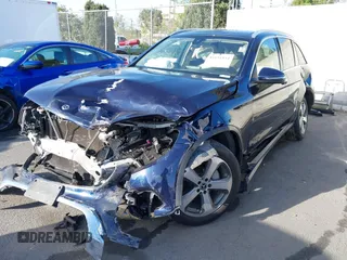 2019 Mercedes-Benz GLC with VIN WDC0G4JB6KF567472, listed as a IAAI auction lot 41691934 with 82,872 mi miles. Bid and sale history available at carsss.com. Image 2.