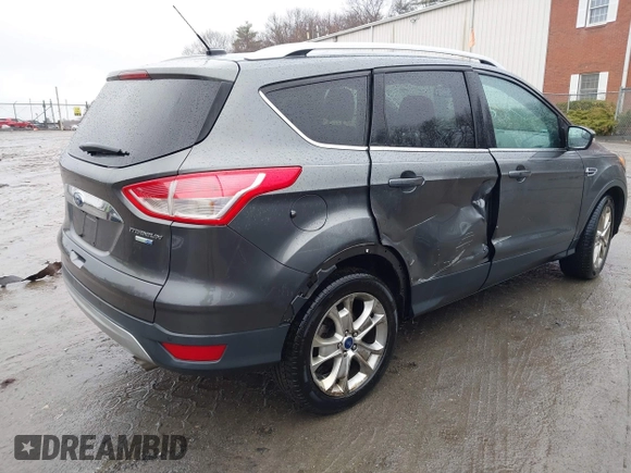 2015 Ford Escape Titanium with VIN 1FMCU9JX6FUB79093, listed as a IAAI auction lot 41805057 with 87,788 mi miles. Bid and sale history available at carsss.com. Image 4.