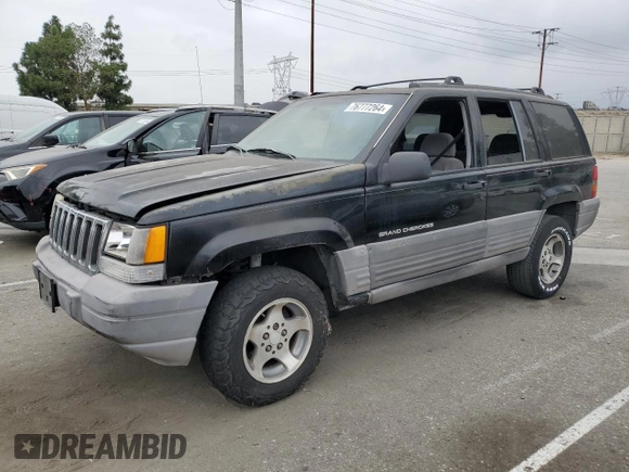 1998 Jeep Grand Cherokee Laredo with VIN 1J4FX58S0WC305329, listed as a Copart auction lot 76777264 with 251,942 mi miles and Clean Title. Bid and sale history available at carsss.com. Image 1.