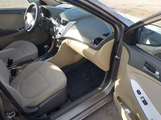 2013 Hyundai Accent GLS with VIN KMHCT4AEXDU464526, listed as a IAAI auction lot 41904354 with 157,368 mi miles. Bid and sale history available at carsss.com. Image 5.