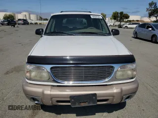 2000 Ford Explorer Eddie Bauer с VIN 1FMDU84P2YZB86557, выставлен на аукционе Copart как лот 59590365 с пробегом 140 872 миль миль и Списание • Salvage title. История ставок и продаж доступна на DreamBid. Изображение 5.