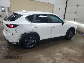 2019 Mazda CX-5 Touring with VIN JM3KFBCM1K0697500, listed as a Copart auction lot 46460735 with 69,412 mi miles and Salvage Title. Bid and sale history available at carsss.com. Image 3.