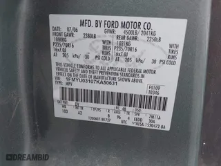 2007 Ford Escape XLT with VIN 1FMYU03107KA50631, listed as a IAAI auction lot 41374784 with 174,870 mi miles. Bid and sale history available at carsss.com. Image 9.