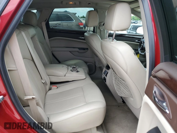 2014 Cadillac SRX Premium Collection z VIN 3GYFNDE33ES571840, wystawiony jako Copart lot #56823845 z przebiegiem 139 686 mil mil oraz Szkoda całkowita • Salvage title. Historia ofert i sprzedaży dostępna na DreamBid. Obrazek 11.